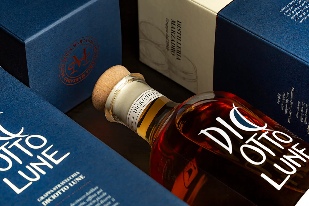 Grappa Marzadro Diciotto Lune tra scatole