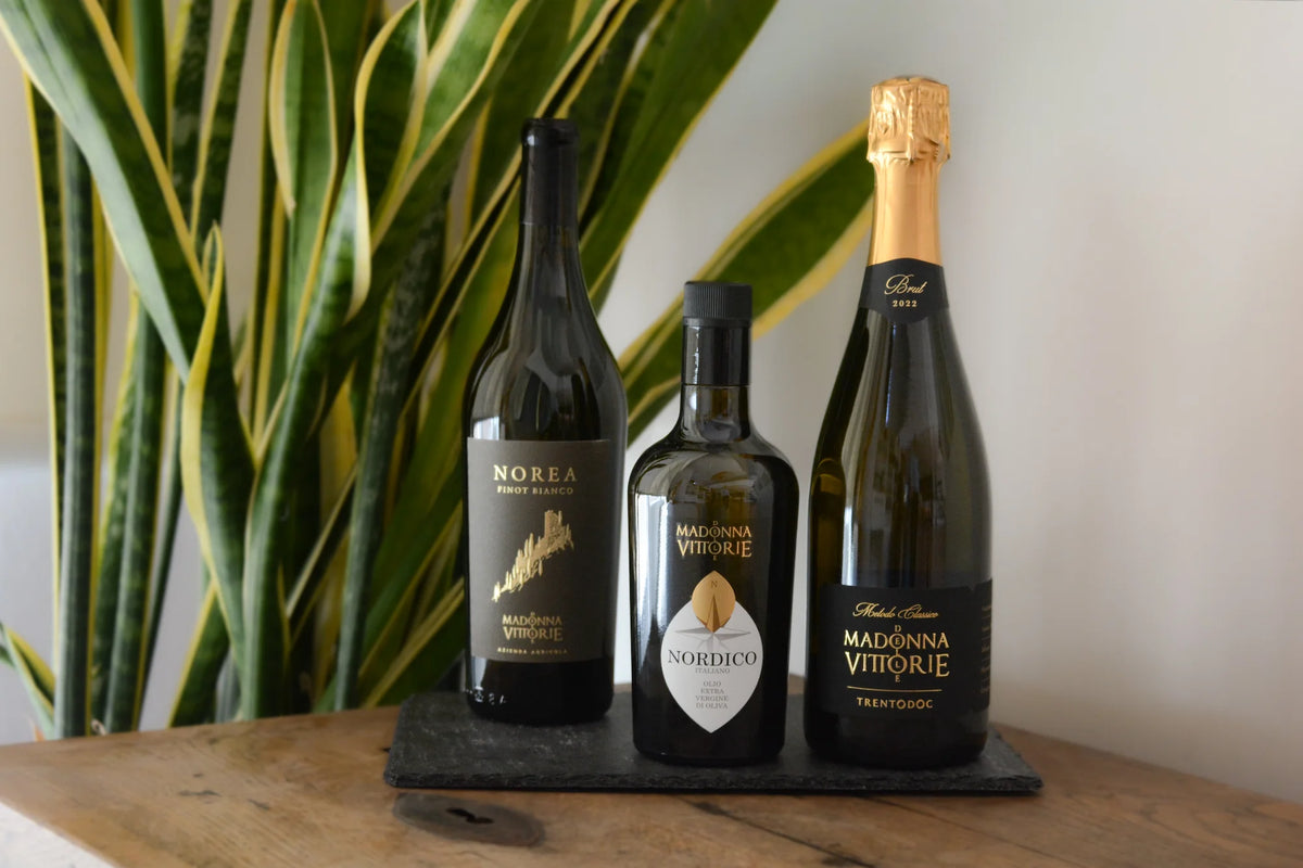 Selezione oli e vini MDV Marzadro, bottiglie assortite